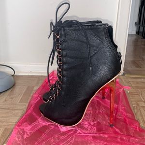 Black and gold booties. Super high heel!
